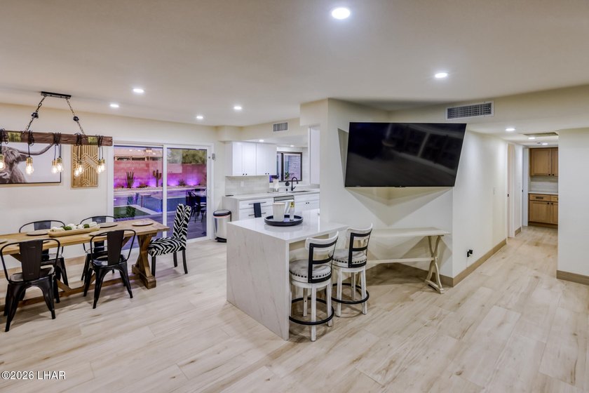 Completely remodeled and loaded with upgrades, this stunning 3 - photo 8