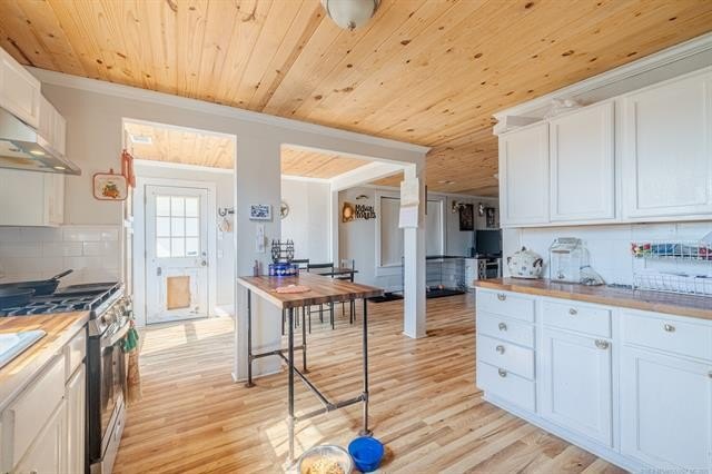 Farmhouse Chic in the Heart of Mannford! This charming 3-bedroom - photo 12