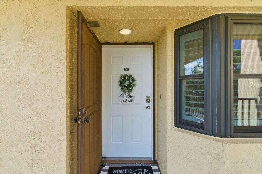 Welcome to your perfect retreat in this beautifully updated - photo 2