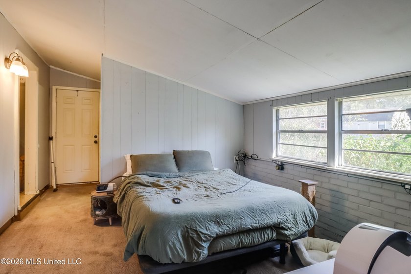 This charming Biloxi property is the perfect blend of comfort - photo 4
