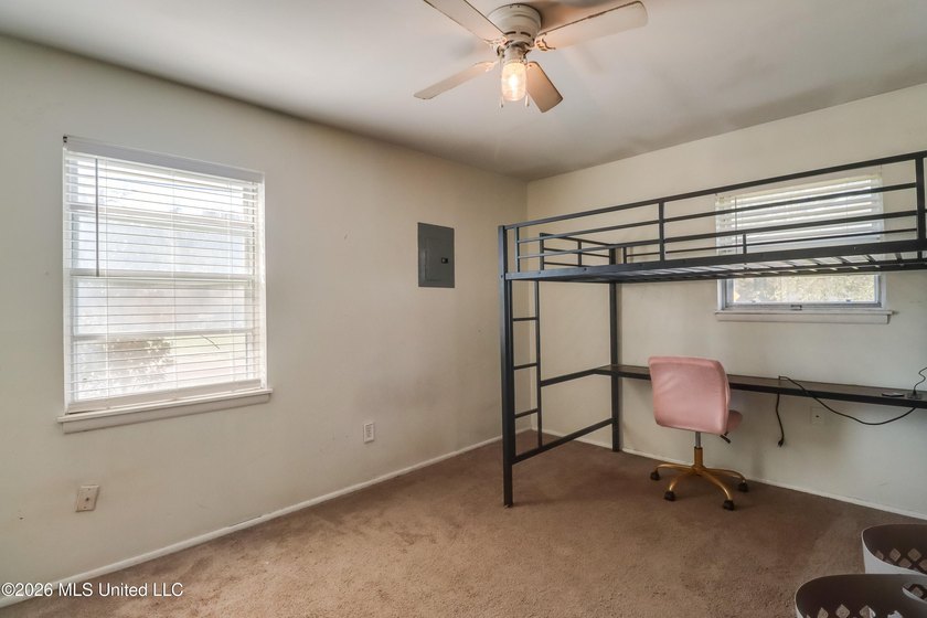 This charming Biloxi property is the perfect blend of comfort - photo 10