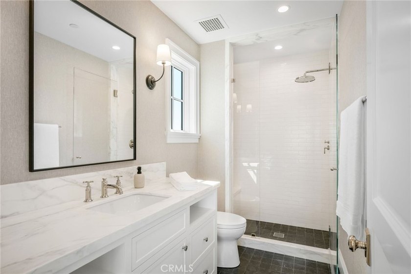 Perched privately above Newport Harbor, 702 Saint James Place is - photo 32