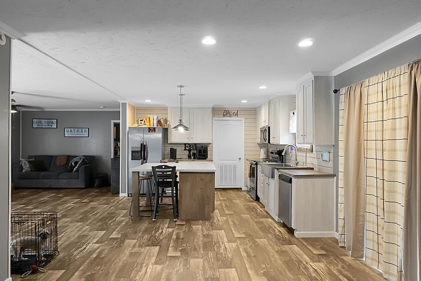 Welcome to this beautiful 4-bedroom, 2-bath home tucked away in - photo 12