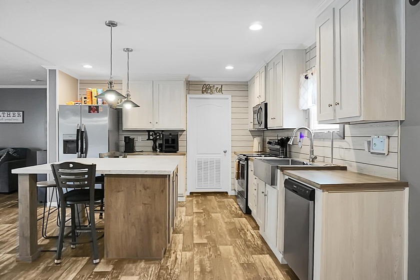Welcome to this beautiful 4-bedroom, 2-bath home tucked away in - photo 13