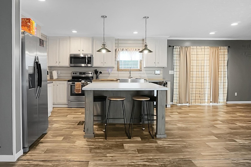 Welcome to this beautiful 4-bedroom, 2-bath home tucked away in - photo 15