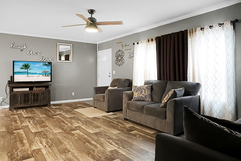 Welcome to this beautiful 4-bedroom, 2-bath home tucked away in - photo 26