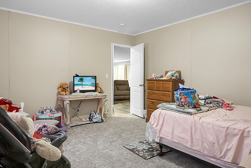 Welcome to this beautiful 4-bedroom, 2-bath home tucked away in - photo 33