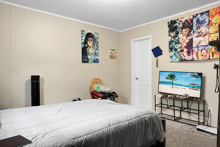 Welcome to this beautiful 4-bedroom, 2-bath home tucked away in - photo 35
