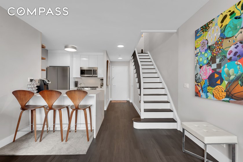 Sleek downtown style meets timeless Upper West Side living in - photo 3