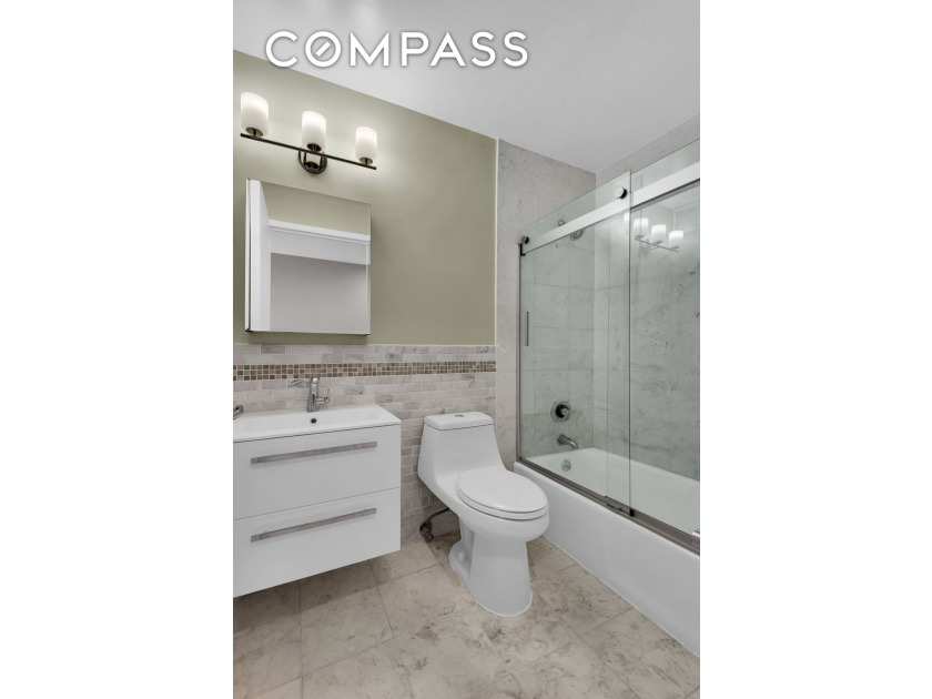 Sleek downtown style meets timeless Upper West Side living in - photo 10