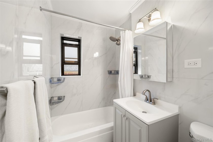 Welcome to this spacious and well-maintained 1st-floor unit in - photo 13