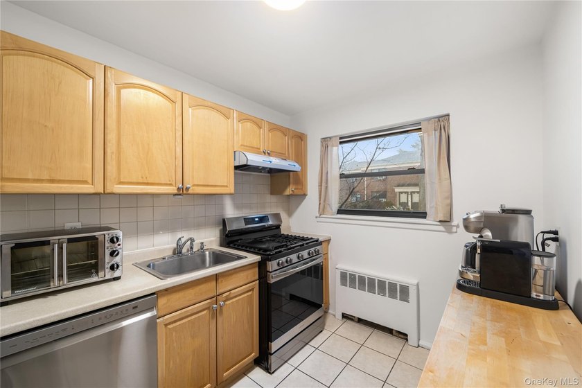 Welcome to this spacious and well-maintained 1st-floor unit in - photo 17