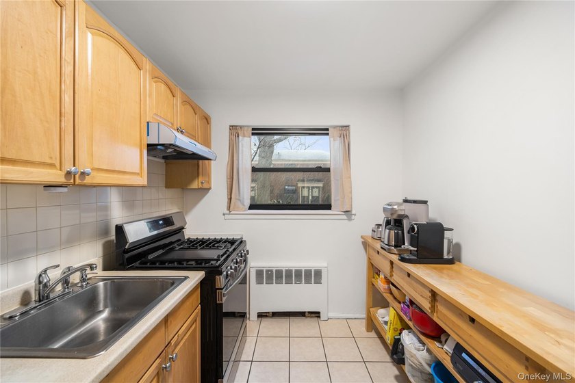 Welcome to this spacious and well-maintained 1st-floor unit in - photo 18