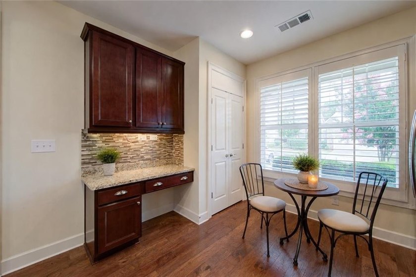 Welcome home to effortless luxury in one of Lake Lanier's most - photo 11