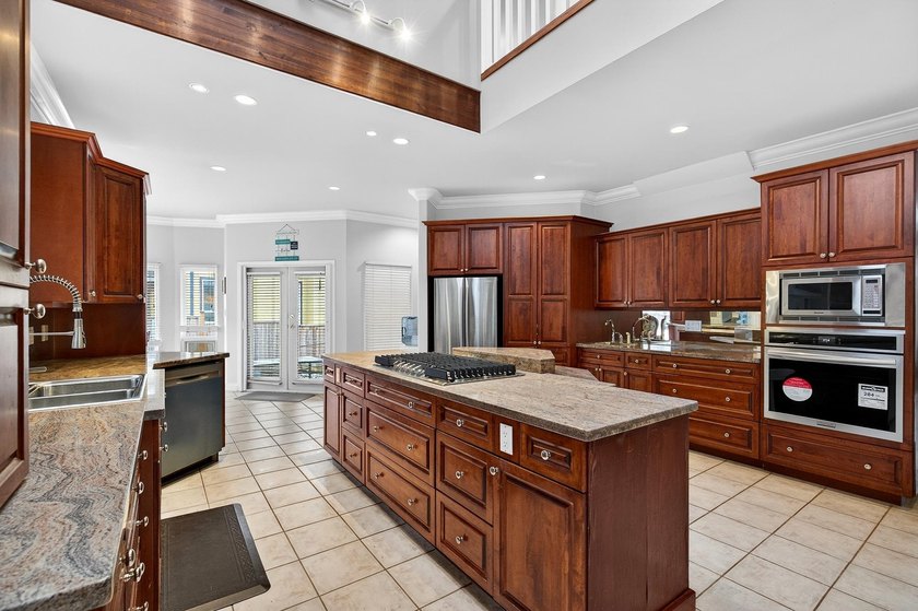 Nestled in prestigious Abbey Ridge in Fraser Heights, and just a - photo 12