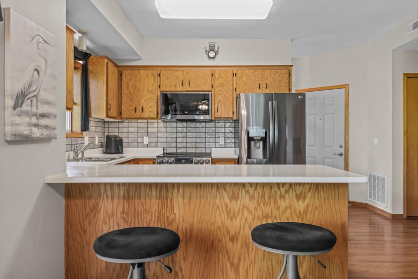 Very peaceful setting for this one level end unit townhome - photo 14