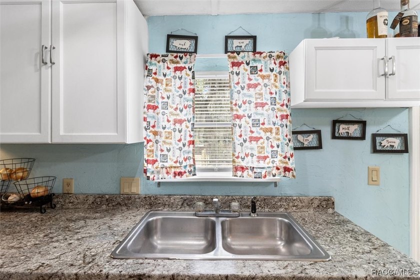 Welcome to this charming 3-bedroom, 2-bath nestled on 1.10 fully - photo 14
