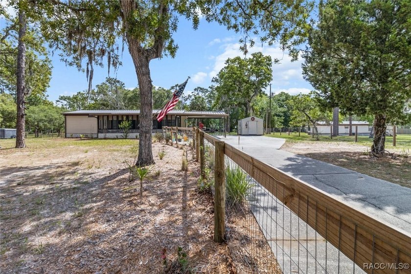 Welcome to this charming 3-bedroom, 2-bath nestled on 1.10 fully - photo 32