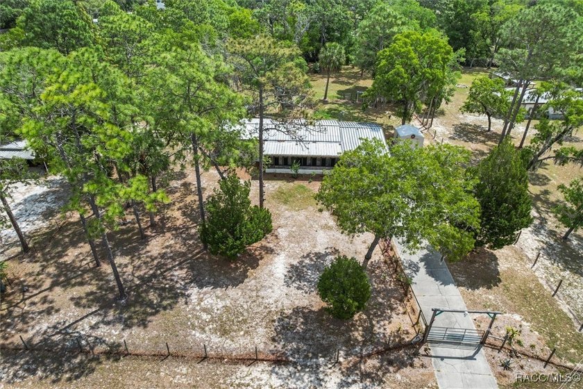 Welcome to this charming 3-bedroom, 2-bath nestled on 1.10 fully - photo 35
