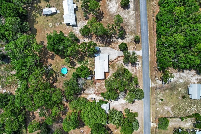 Welcome to this charming 3-bedroom, 2-bath nestled on 1.10 fully - photo 47