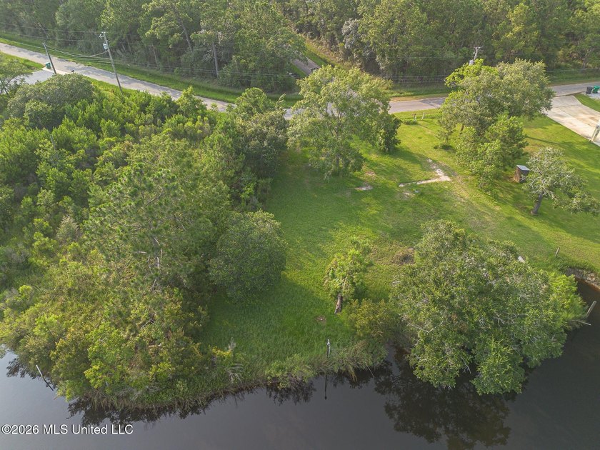 This is the one, a beautiful double lot on the canal located on - photo 11