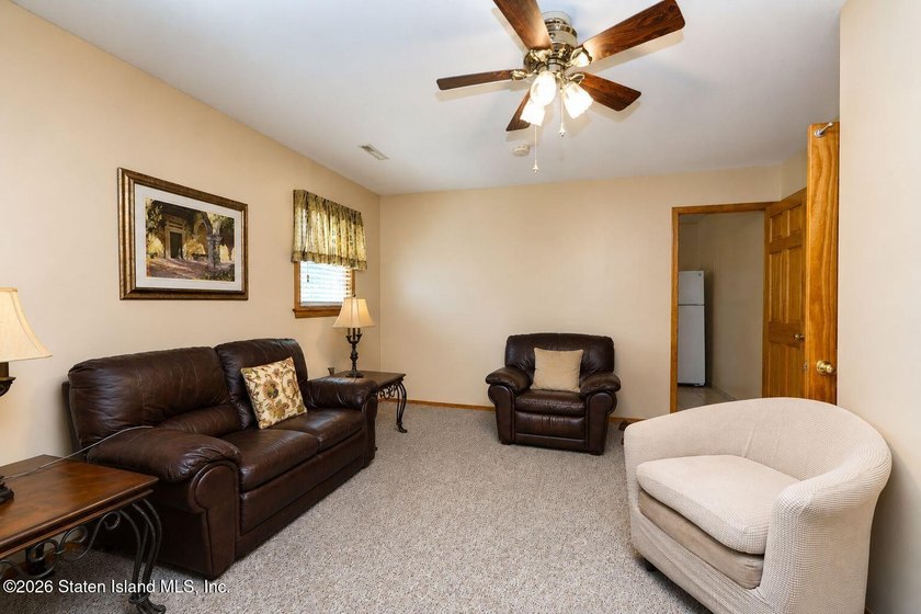 THIS TWO FAMILY HI-RANCH OFFERS A 3 BEDROOM MASTER PLUS A ONE - photo 26