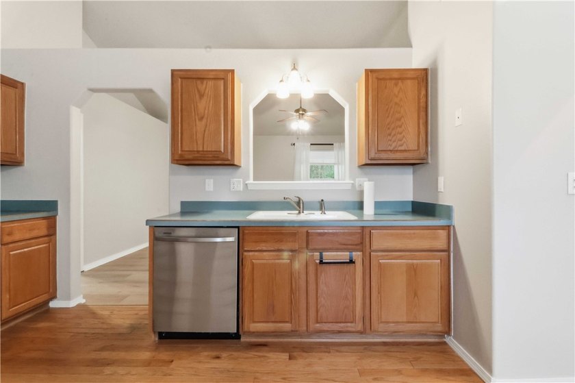 Welcome to this well-maintained 3-bedroom, 2-bath home in a - photo 9