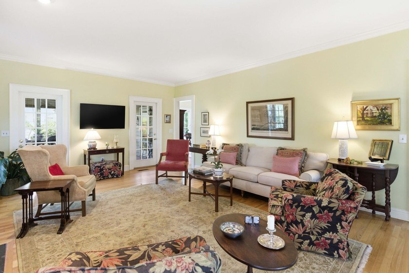 Located beneath breathtaking live oaks in the heart of the - photo 15