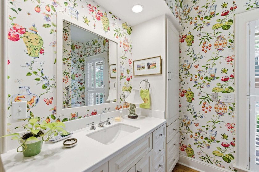 Located beneath breathtaking live oaks in the heart of the - photo 27