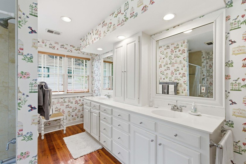 Located beneath breathtaking live oaks in the heart of the - photo 34