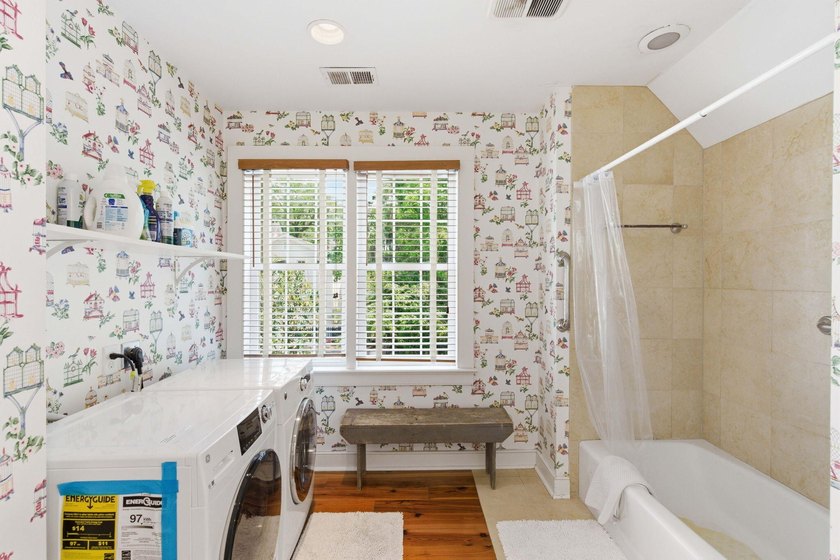 Located beneath breathtaking live oaks in the heart of the - photo 35