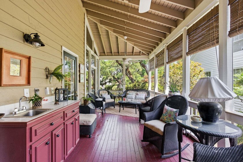 Located beneath breathtaking live oaks in the heart of the - photo 37