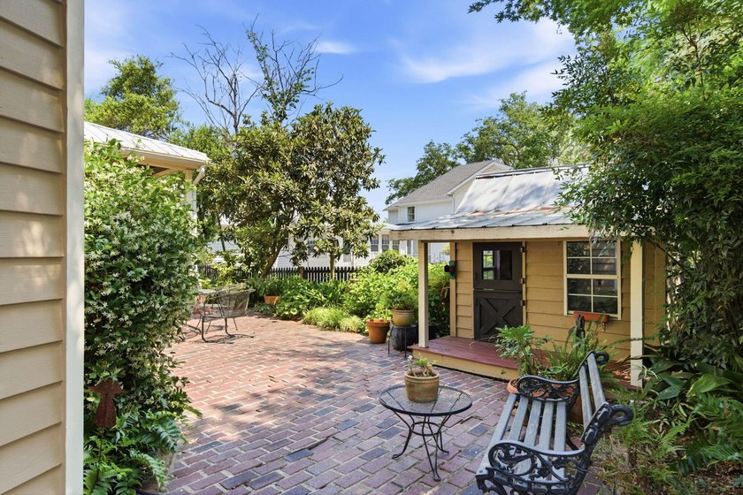Located beneath breathtaking live oaks in the heart of the - photo 38