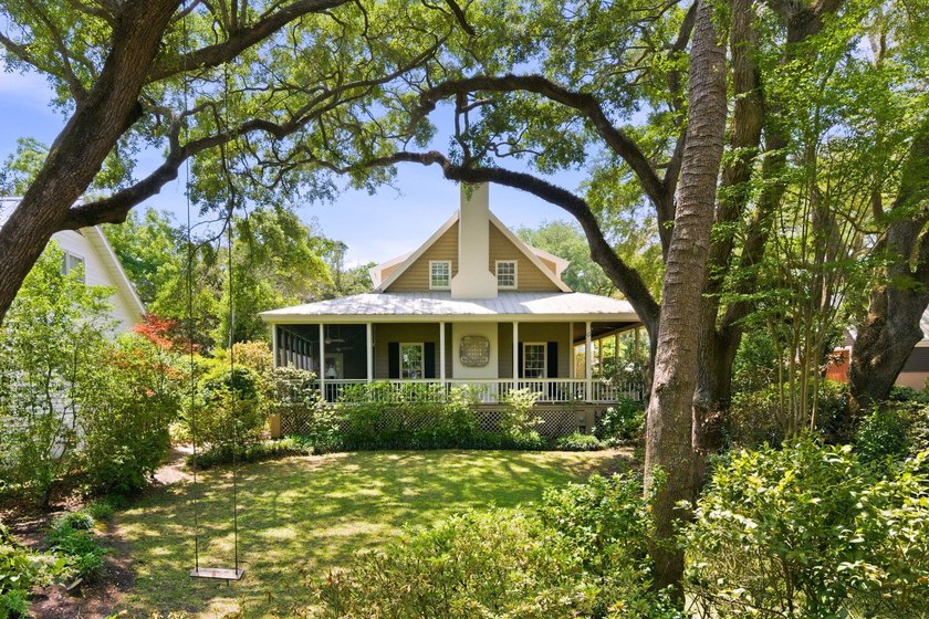 Located beneath breathtaking live oaks in the heart of the - photo 41