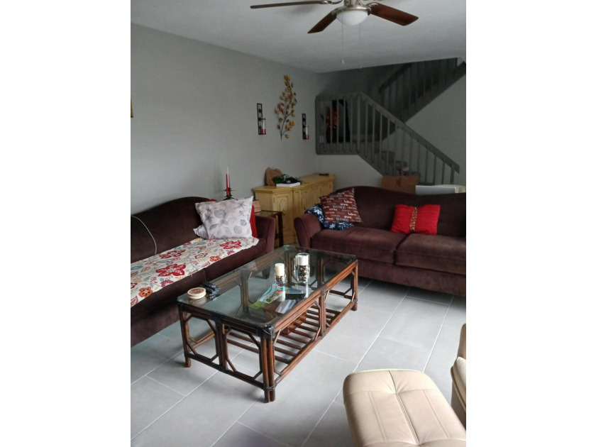 Centrally located large townhome with tile on 1st floor, wood on - photo 13
