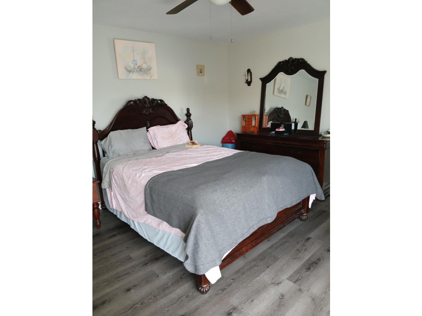 Centrally located large townhome with tile on 1st floor, wood on - photo 16