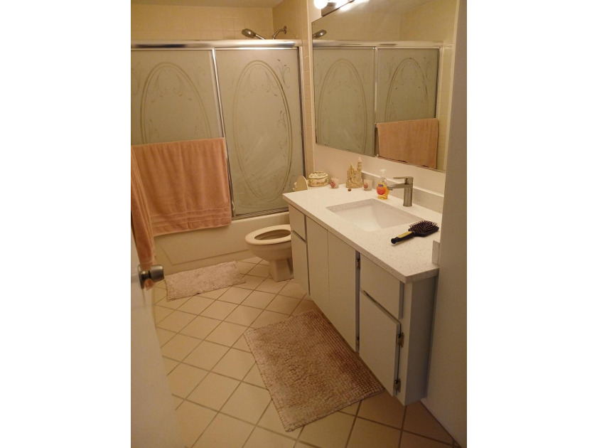 Centrally located large townhome with tile on 1st floor, wood on - photo 21