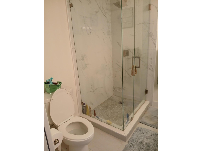 Centrally located large townhome with tile on 1st floor, wood on - photo 22