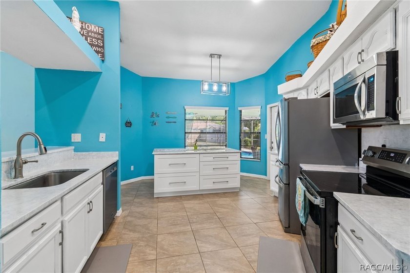 Welcome to this beautifully updated 4-bedroom, 2-bath pool home - photo 38