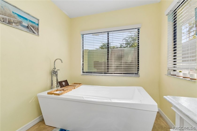 Welcome to this beautifully updated 4-bedroom, 2-bath pool home - photo 48