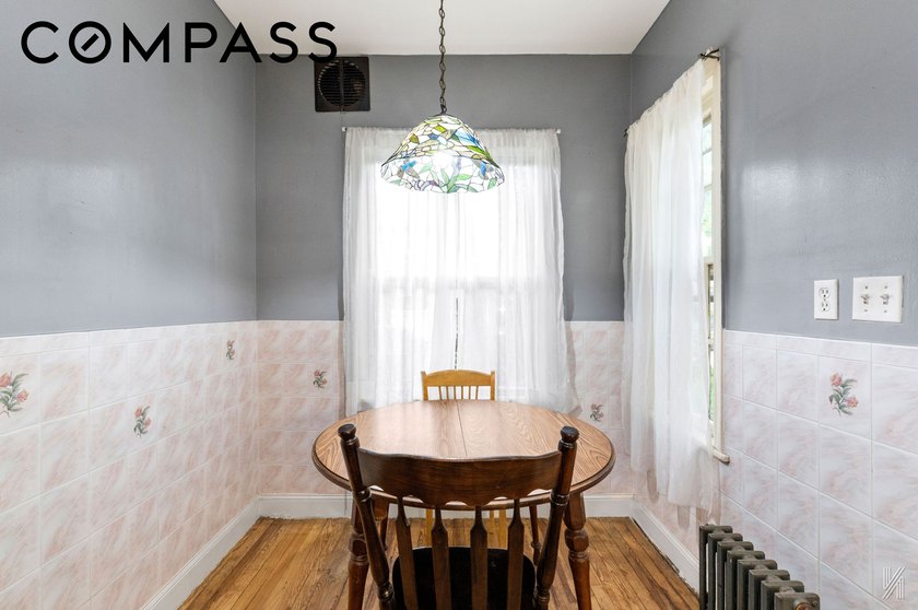 A rare opportunity to own a landmarked 1920s brick townhouse in - photo 7