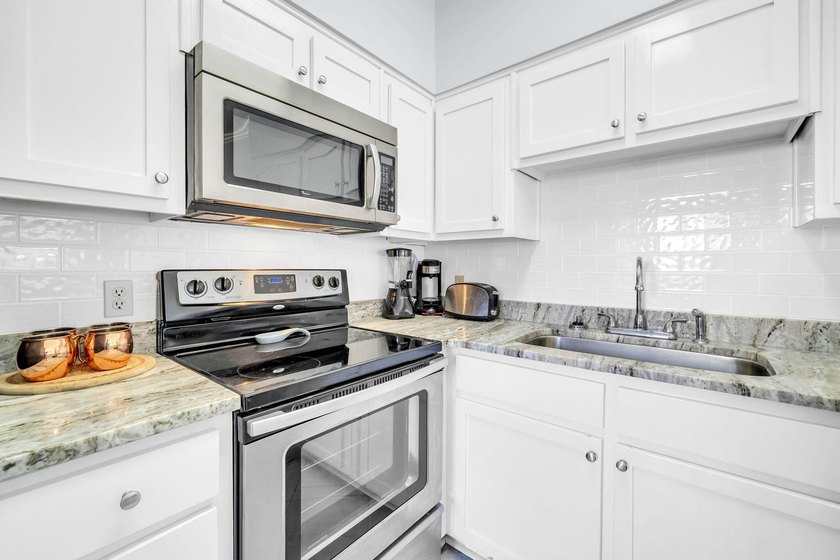 Welcome to The Palms at Seagrove, ideally situated in the heart - photo 17