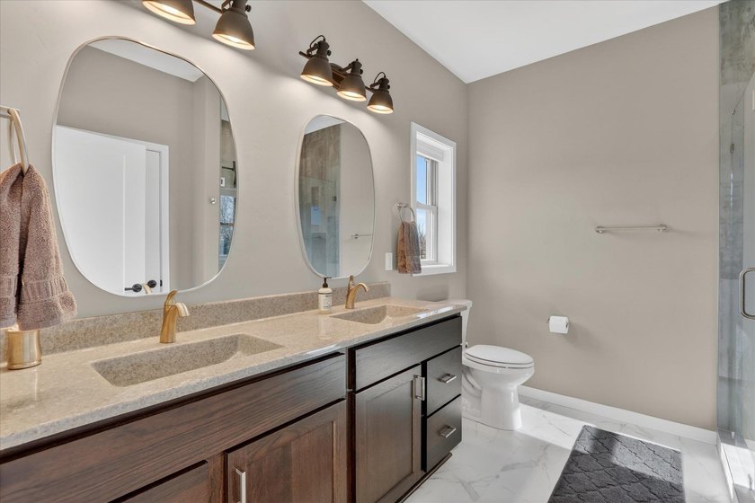 Welcome home to this beautifully designed 2025-built condo - photo 21