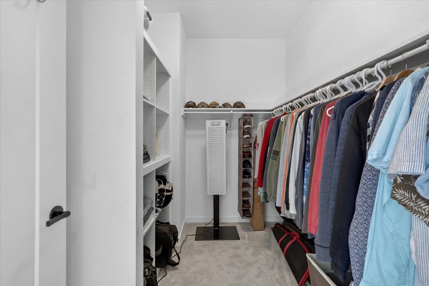 Welcome home to this beautifully designed 2025-built condo - photo 24