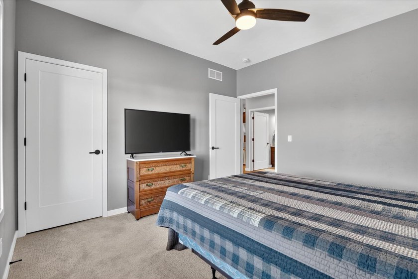 Welcome home to this beautifully designed 2025-built condo - photo 26