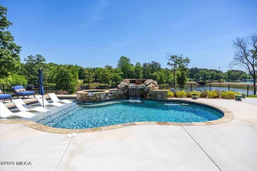 Tucked away in a private cove and set on an expansive 3 acre lot - photo 50