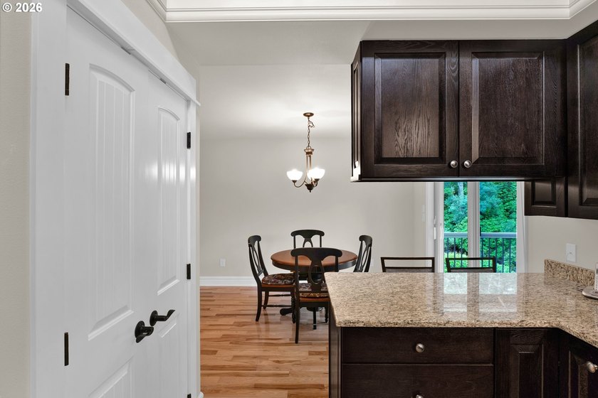 First time on the market, this custom-built retreat offers your - photo 11