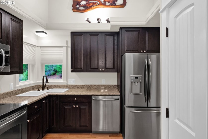 First time on the market, this custom-built retreat offers your - photo 12