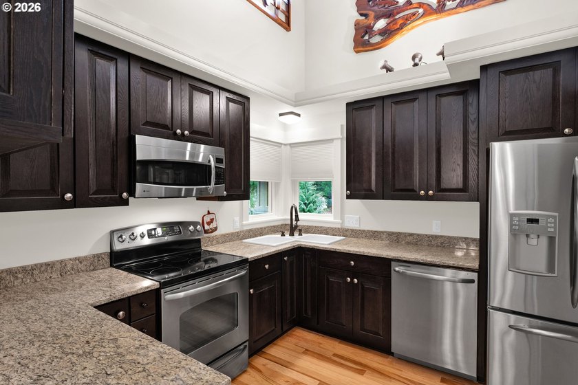First time on the market, this custom-built retreat offers your - photo 13