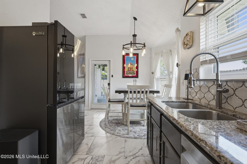 Welcome to 309 Woodcrest... a home in Long Beach so perfect that - photo 11
